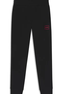 Hombre HUGO Pantalones><noscript><img width=