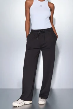 Mujer Dash and Stars Deporte>Pantalón largo ancho suave